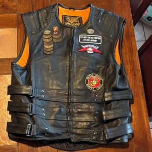 Men’s black leather, Harley Davidson vest with concealed carry pockets inside.